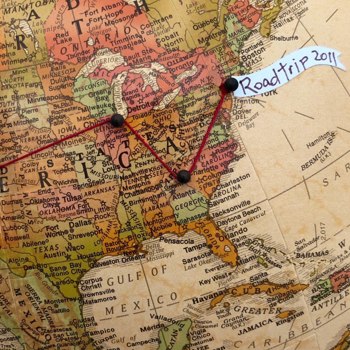 World Explorer pin globe close up